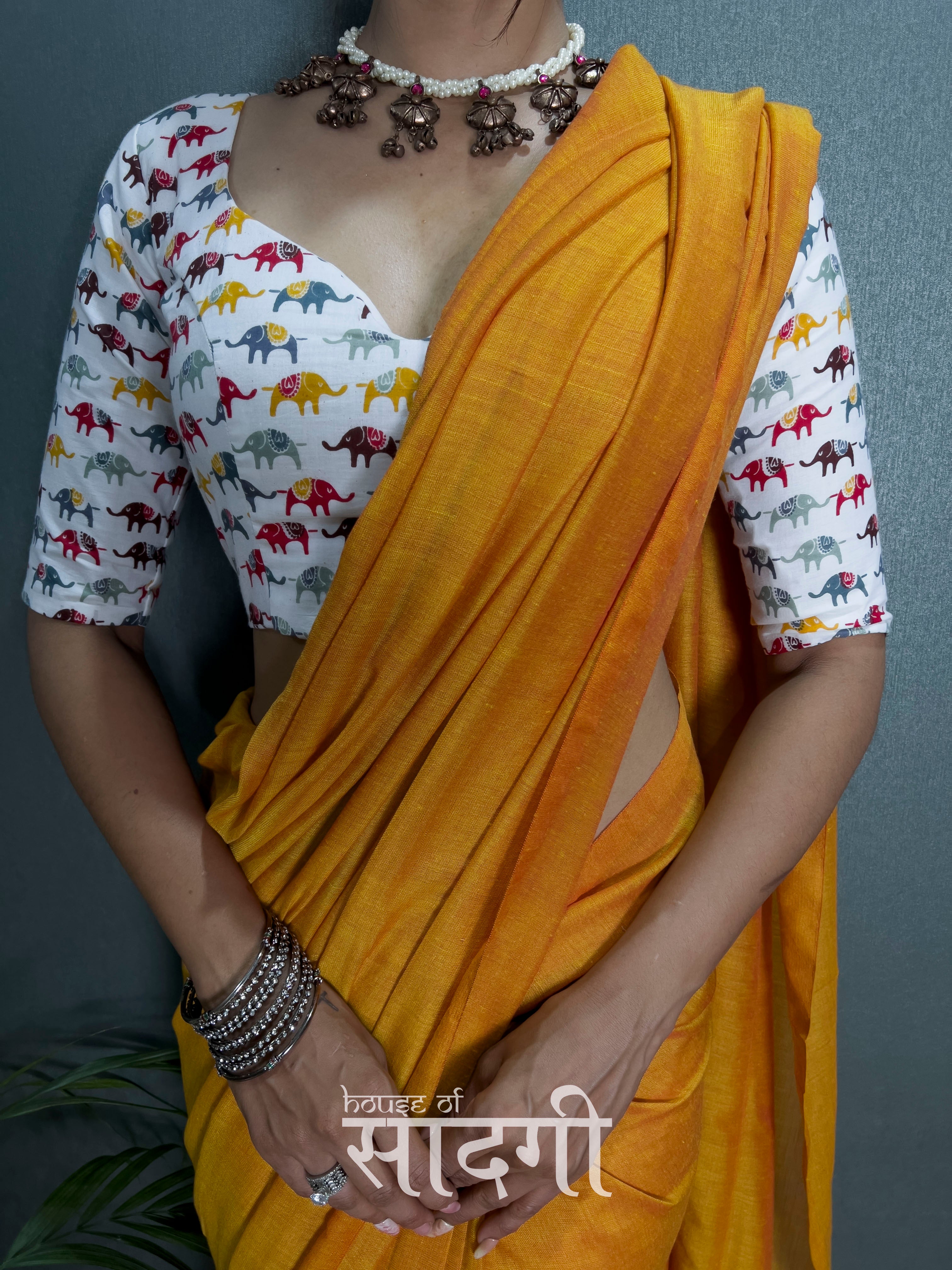 Mustard Handloom Cotton Saree With  Animal  Printed Blouse